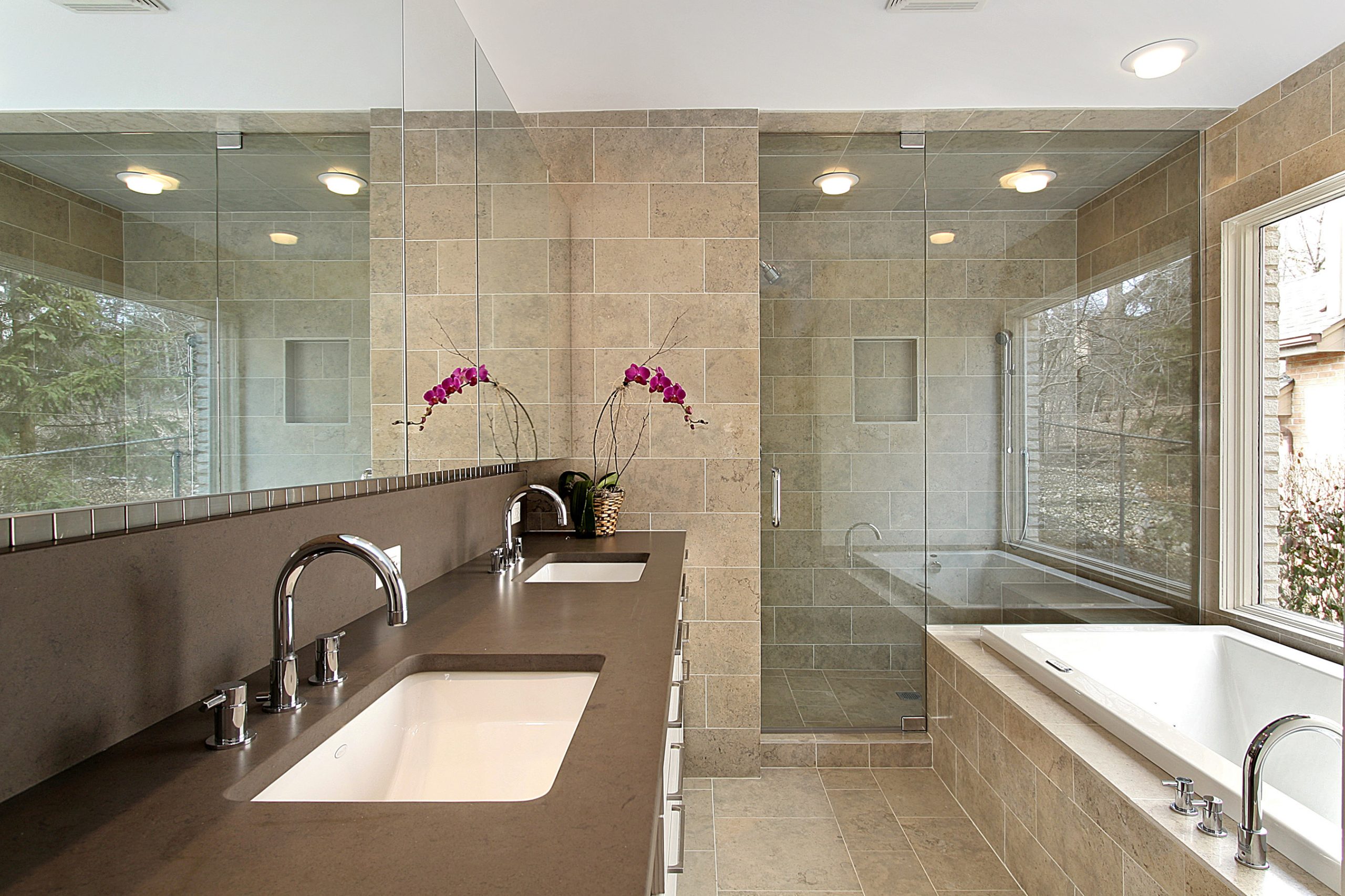 Master bath in modern home with glass shower